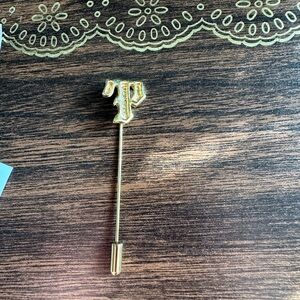 vintage gold-tone "T" monogram stick pin